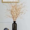 pampas doré dans un vase noir